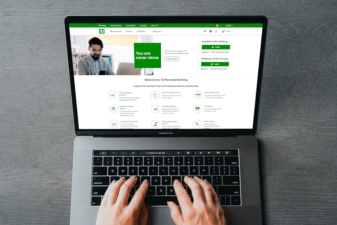 Person typing on a laptop — representing the Tandem online submission system